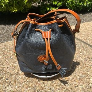 Dooney & Bourke Black and Tan Drawstring Bucket Shoulder Bag